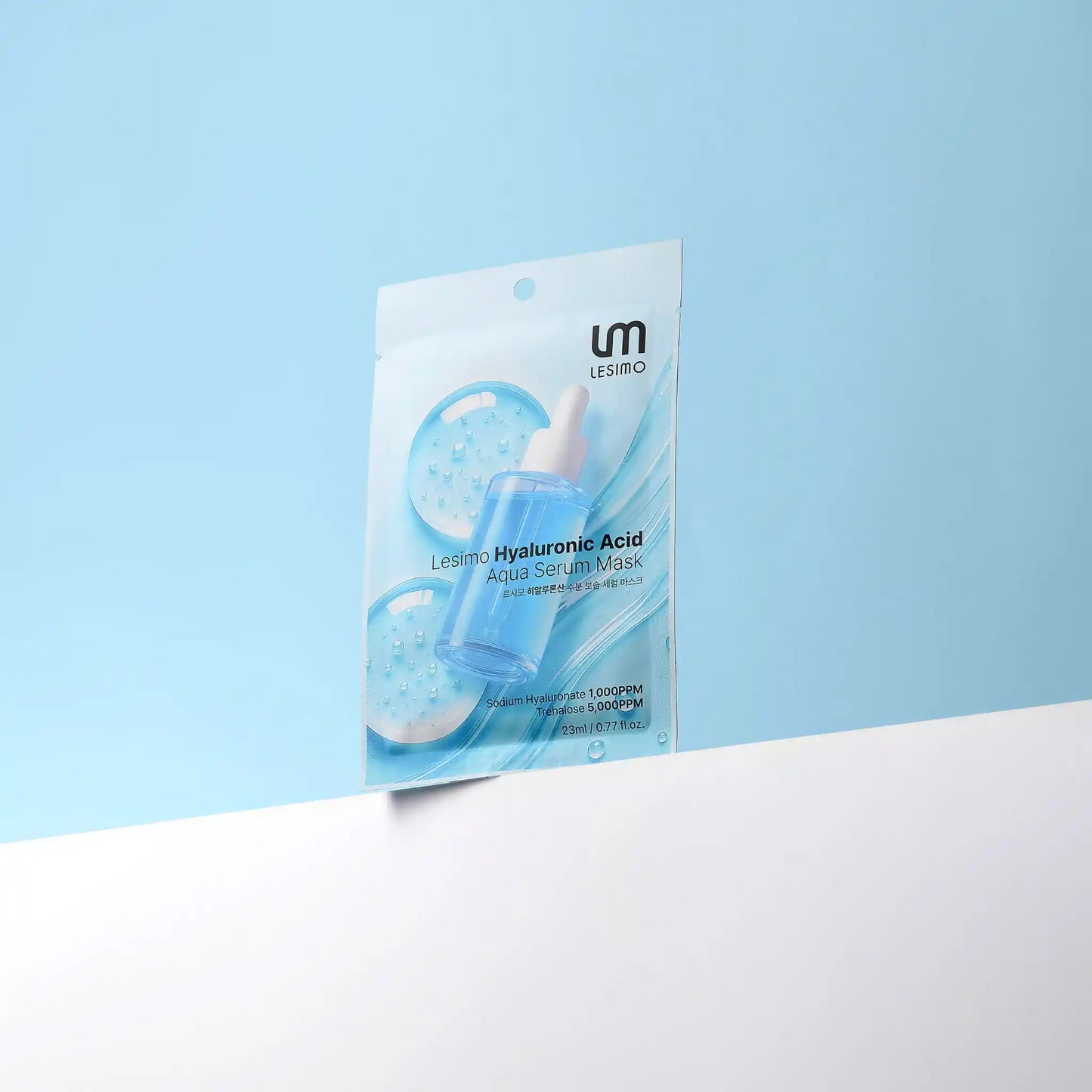 Lesimo Hyaluronic Acid Aqua Serum Mask packaging on a light blue background