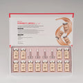 Set of DERMWHITE Ampoule bottles in a decorative box on a gray background