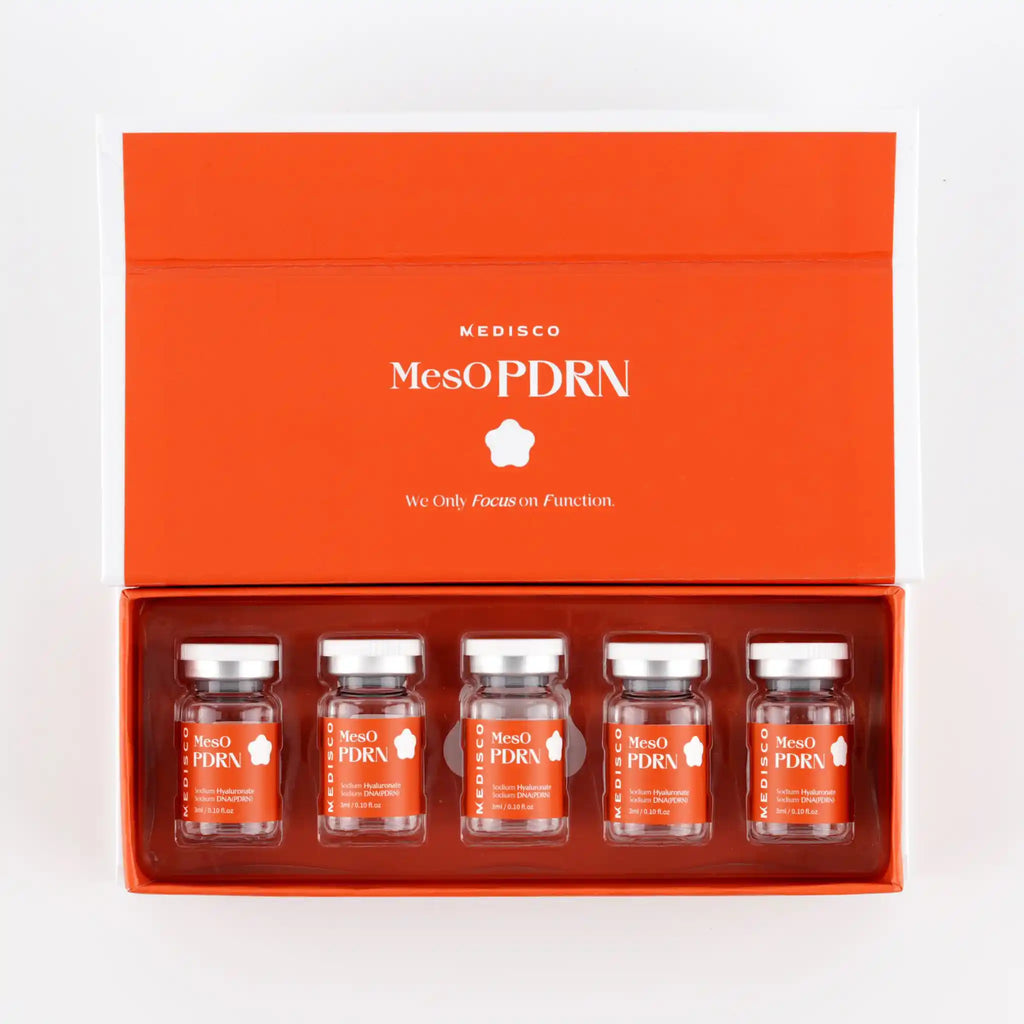 Set of MesOPDRN skincare products in an orange box on a white background