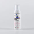 Bottle of neutralizing foam with a white background
