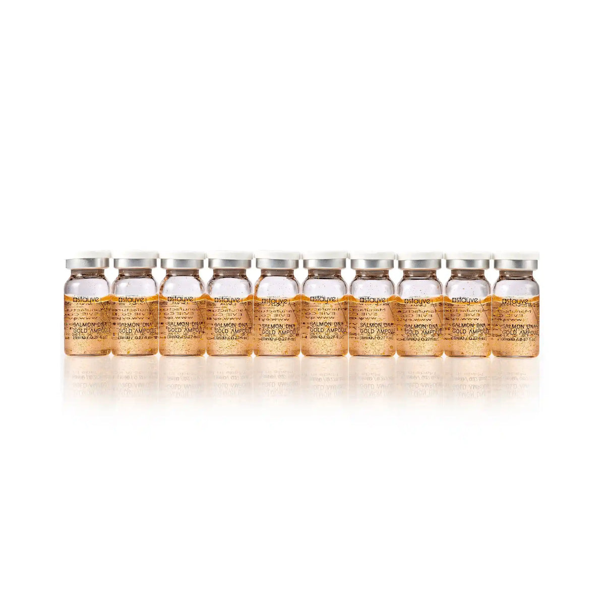Row of identical skincare product bottles on a white background