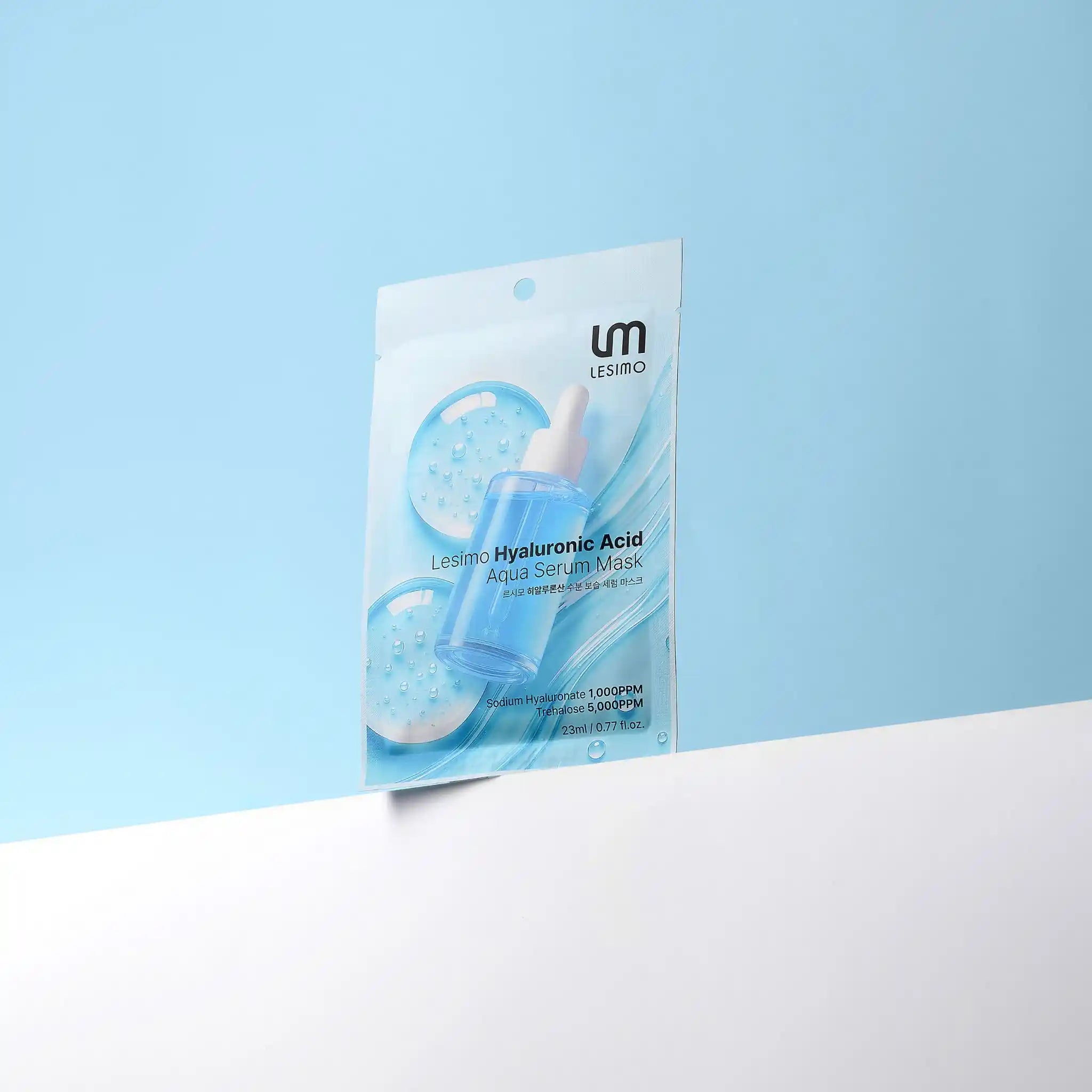 Lesimo Hyaluronic Acid Aqua Serum Mask packaging on a light blue background
