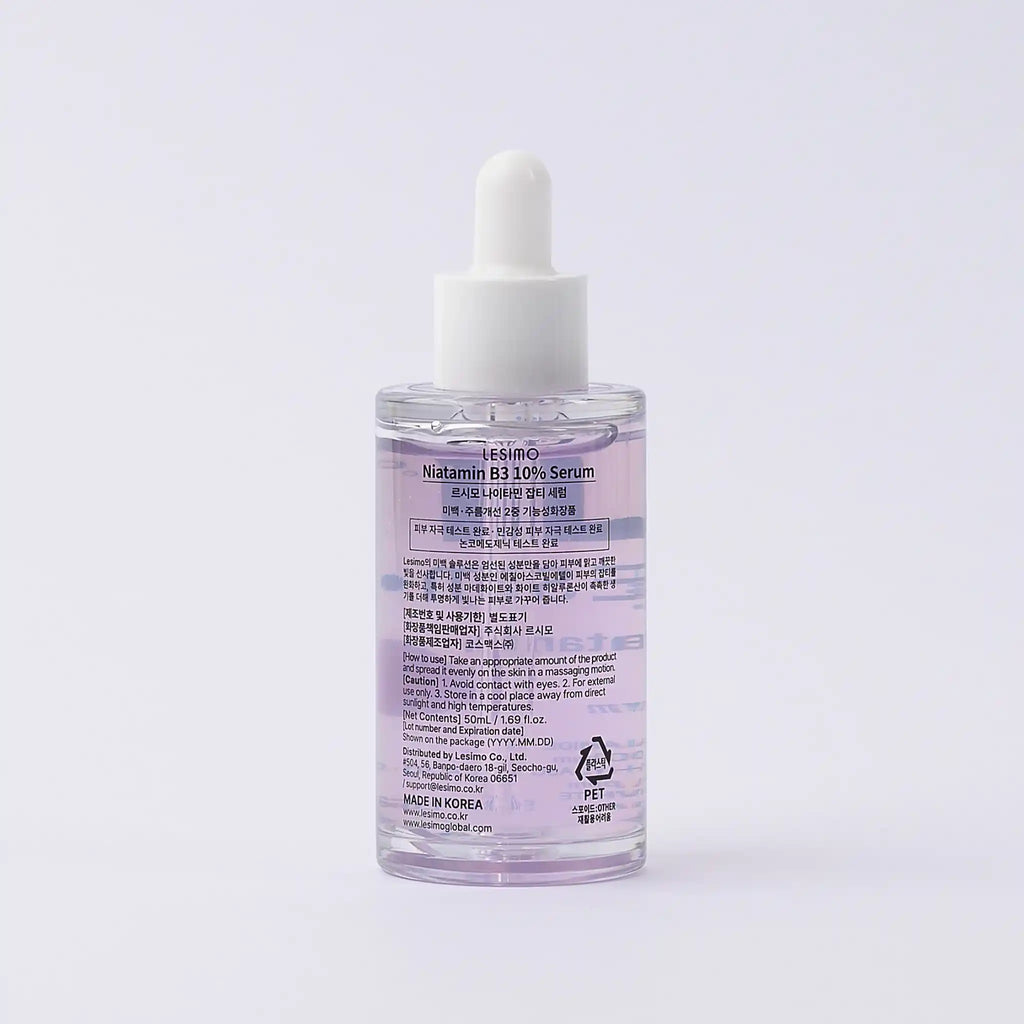 Serum bottle with dropper on a light gray background