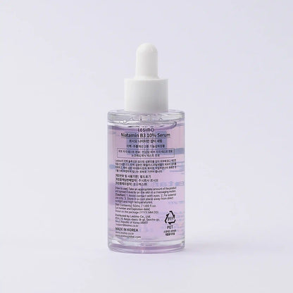 Serum bottle with dropper on a light gray background