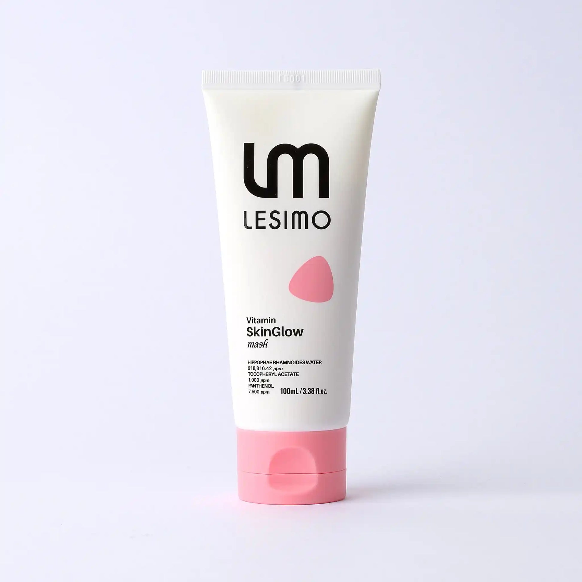 Tube of LESIMO SkinGlow mask on a light gray background